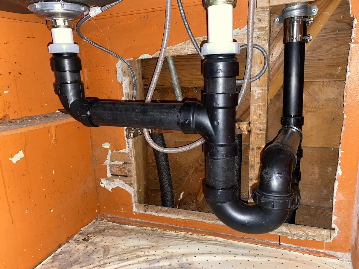 Professional Garbage Disposal Repair equipment and tools on the job in Vernon